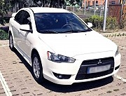 182 Mitsubishi Lancer белый аренда авто Киев