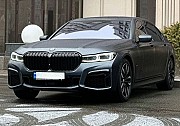 353 Прокат авто BMW M760 LI без водителя аренда с водителем на фото съемки видео Киев