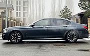 353 Прокат авто BMW M760 LI без водителя аренда с водителем на фото съемки видео Киев